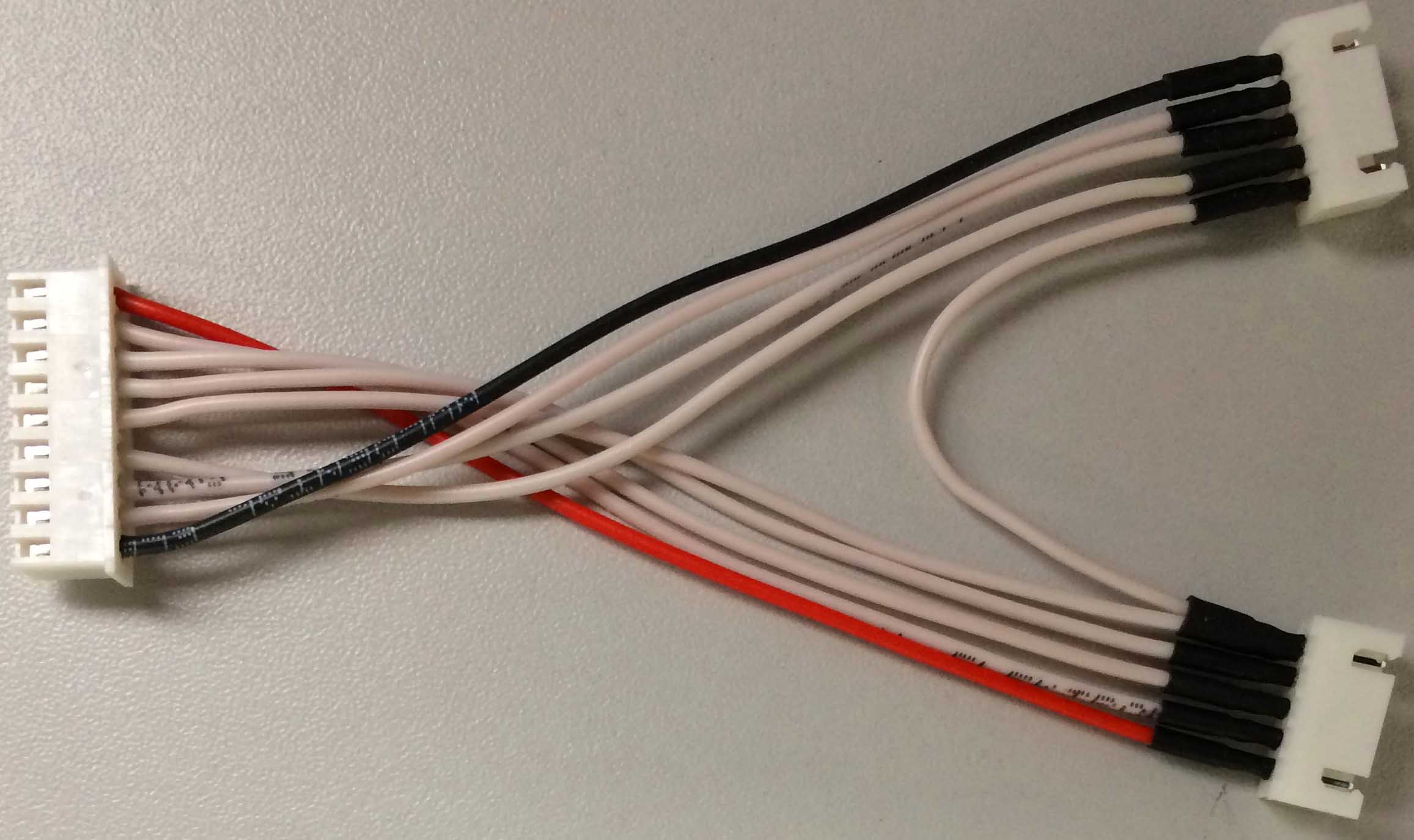 Balancer-Adapterkabel |
9-pol XH-Buch. auf 1 x 5 + 1 x 5-pol. 
XH Stecker, 9 x 0,25 mm², Silikon, 10 cm, 
4 + 4-Zeller XH-Akkus auf 8S-XH, verpackt
- Made in Germany -