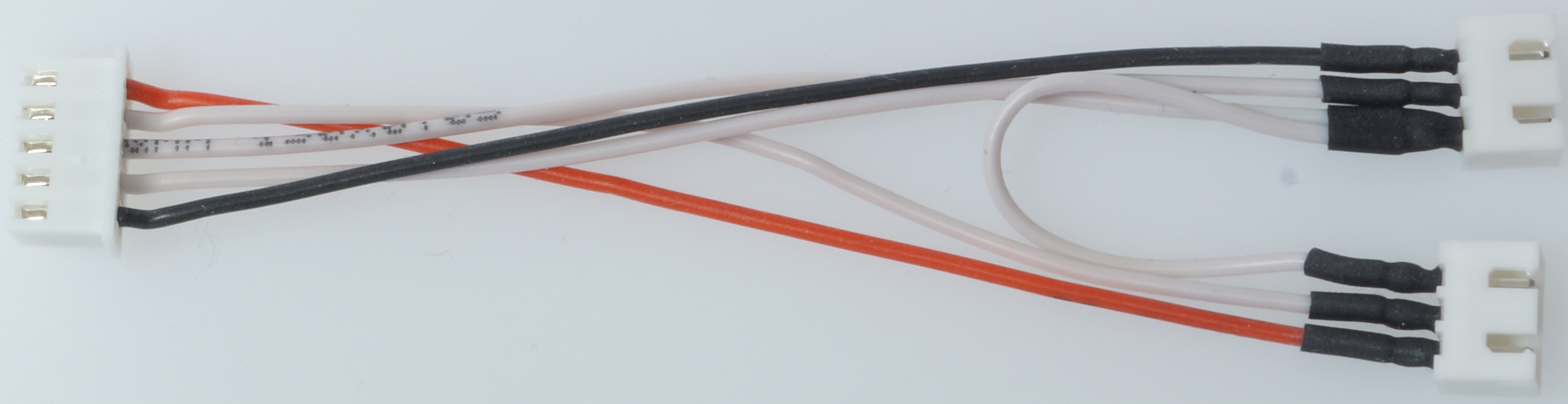 Balancer-Adapterkabel |
10-pol XH-Buch. auf 1 x 5 + 1 x 6-pol. 
XH Stecker, 10 x 0,25 mm², Silikon, 10 cm, 
4 + 5-Zeller XH-Akkus auf 9S-XH, verpackt
- Made in Germany -